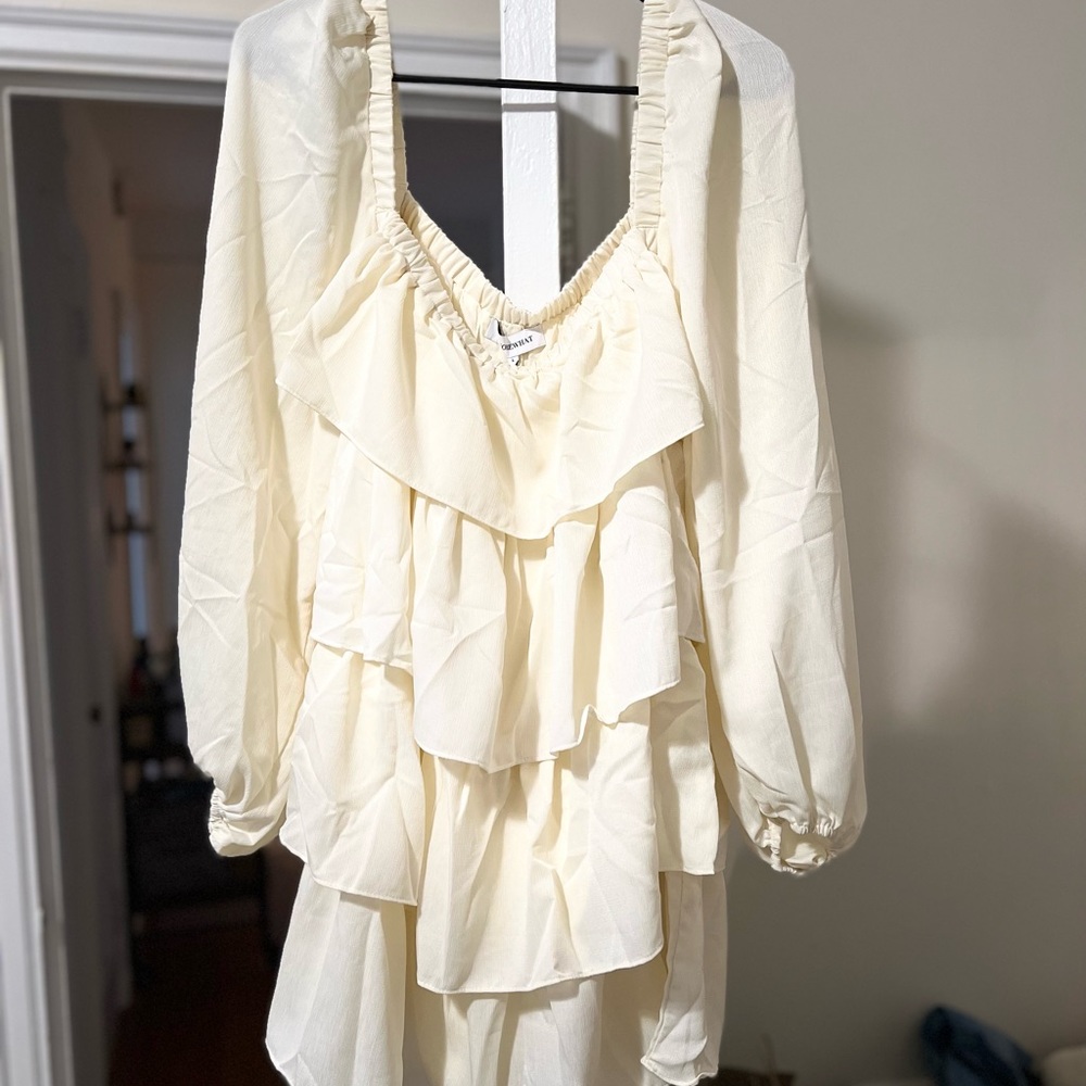 Never been worn WeWoreWhat white/cream mini dress.